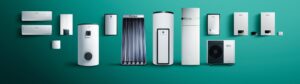 Una gamma completa di sistemi di riscaldamento e climatizzazione Vaillant, inclusi caldaie, pompe di calore, scaldabagni e pannelli solari termici, su sfondo verde.